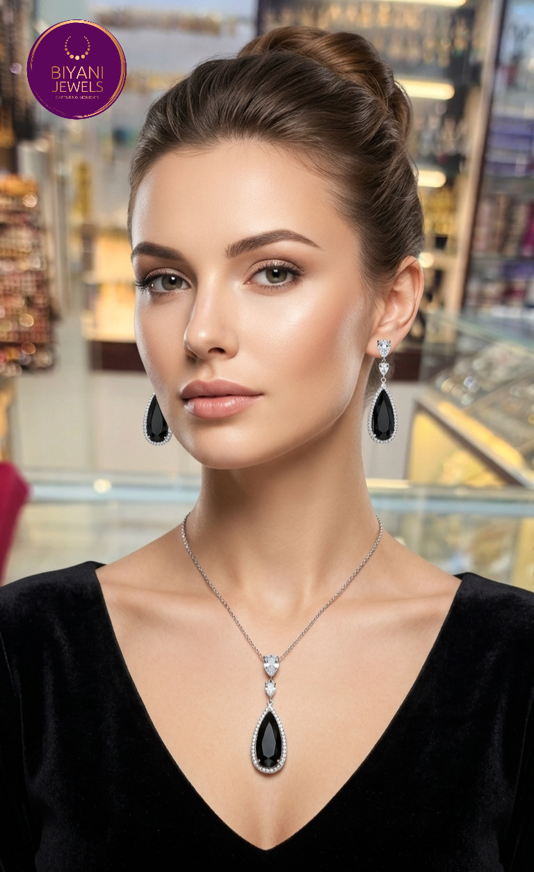 Luxurious Diamond Pendant set Silver-Tone Deep Blue Teardrop Necklace and Earring Set with Clear Accents - Image 3